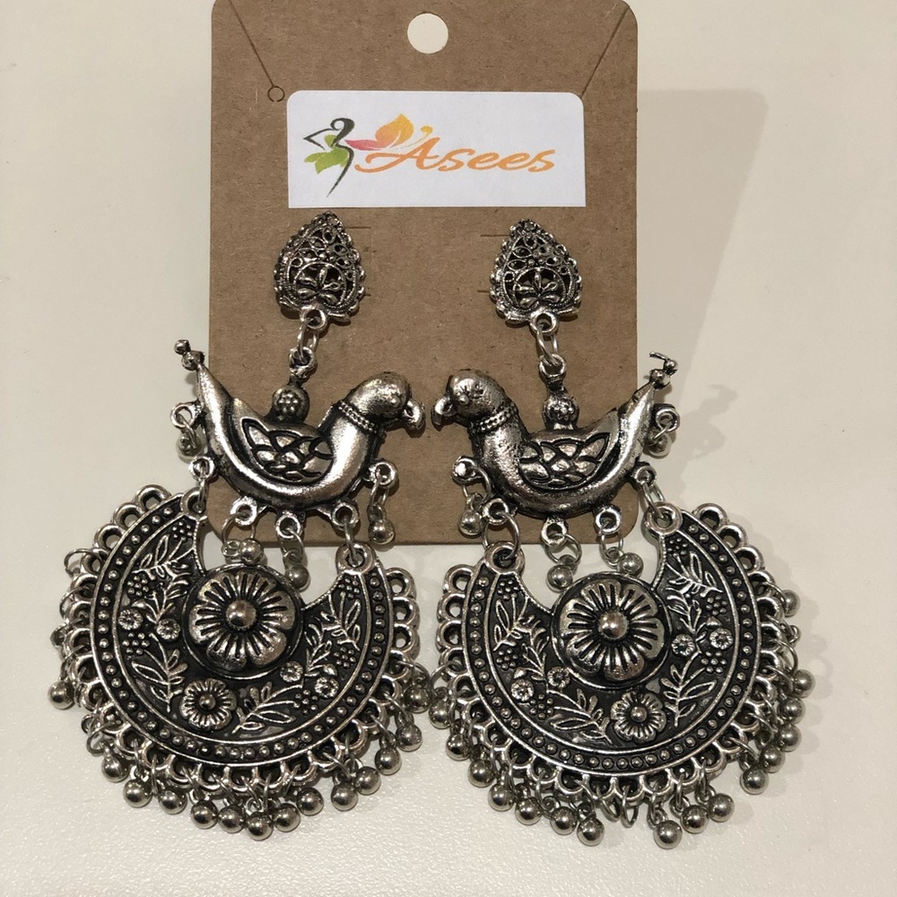 Silver earring birds style